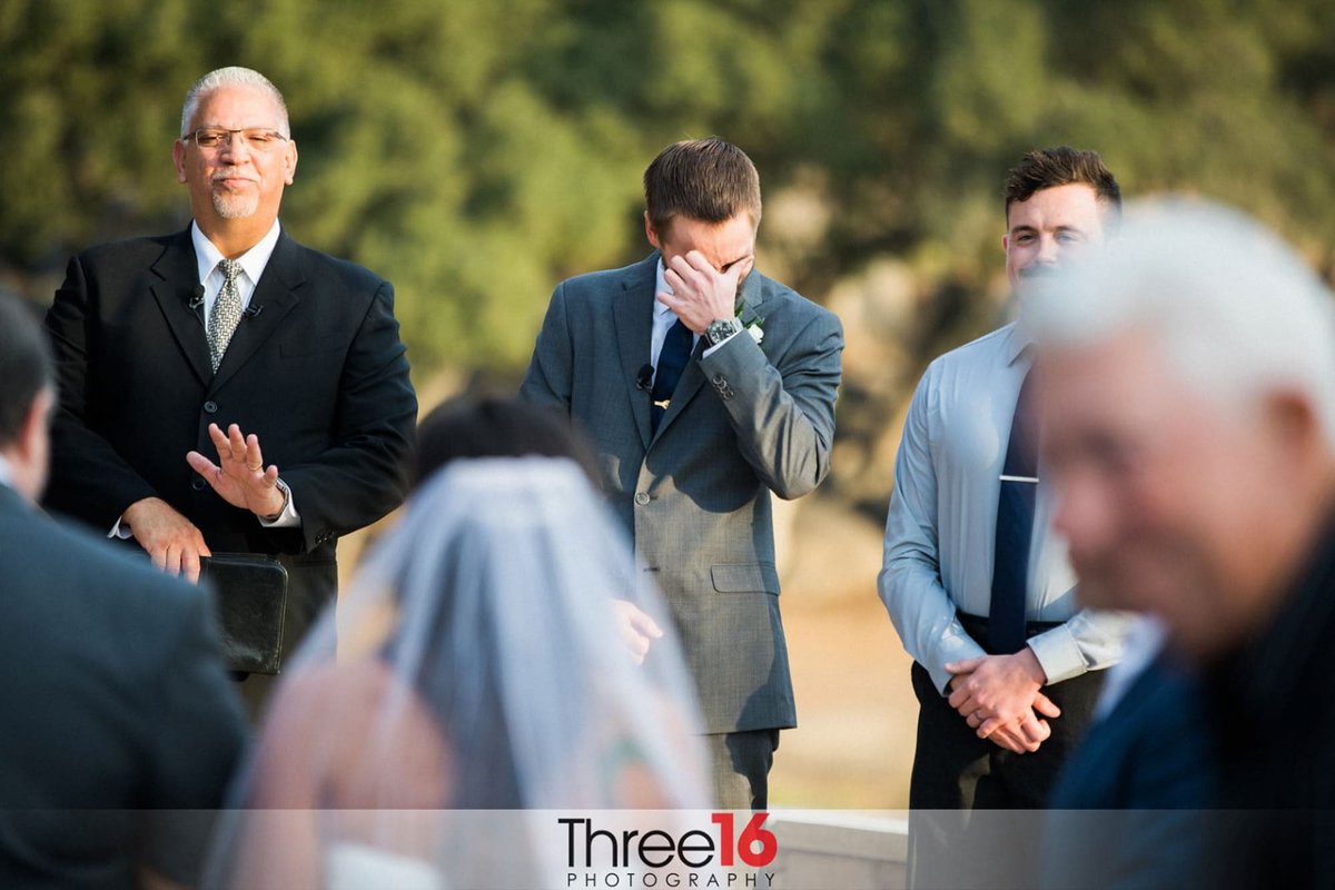 Groom cries as Bride approaches altar