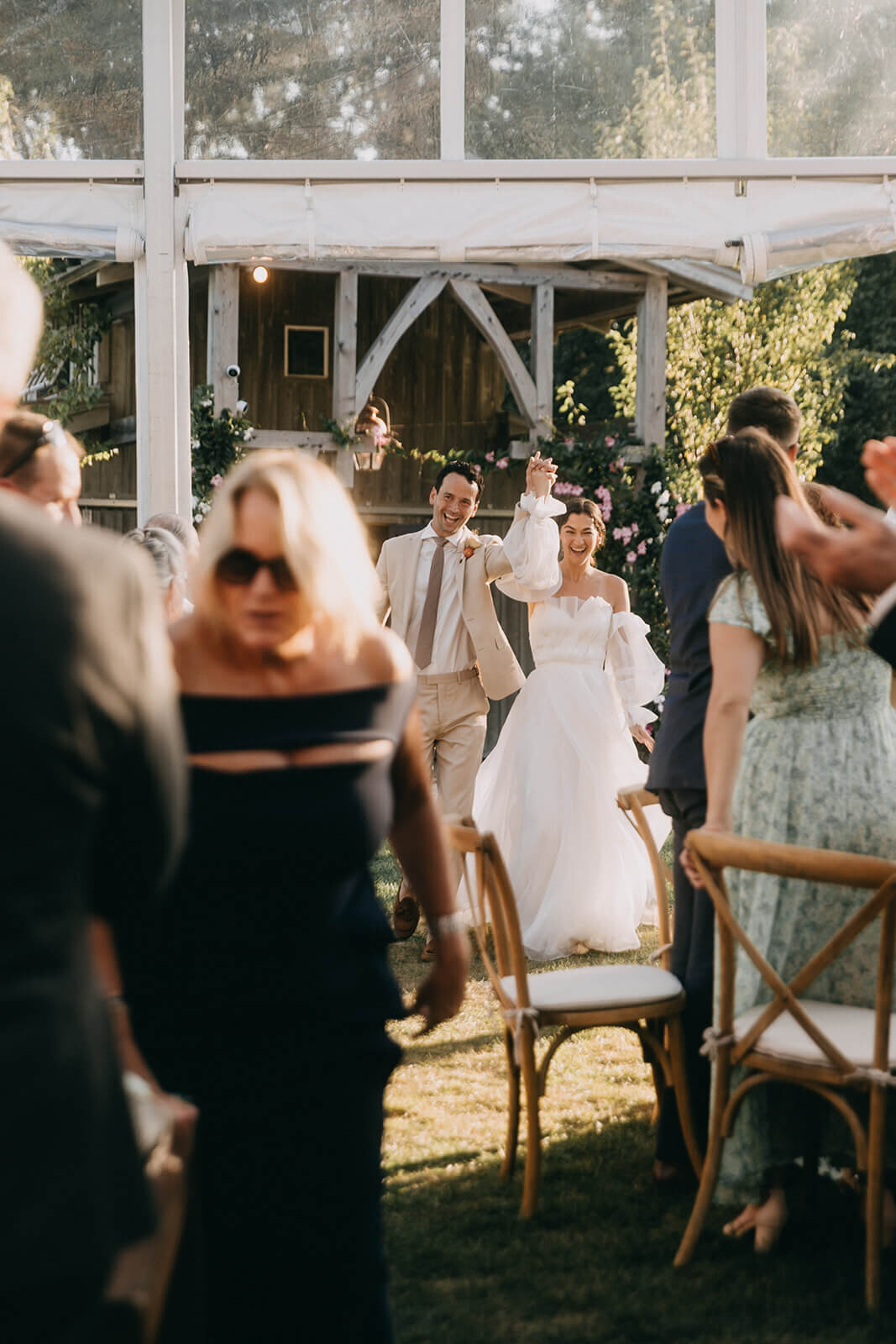 67.bride-and-groom-grand-entrance-wedding-celebration-clear-tent