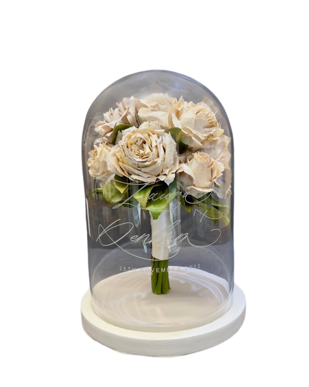 wedding bouquet preserved inside a dome.