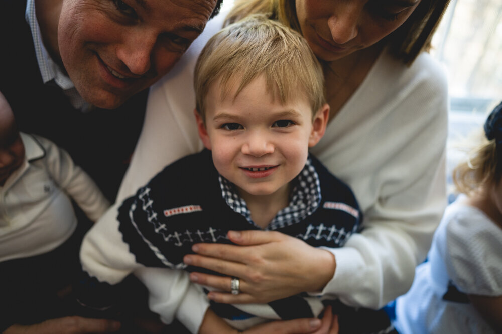 Close up of little boy with parents