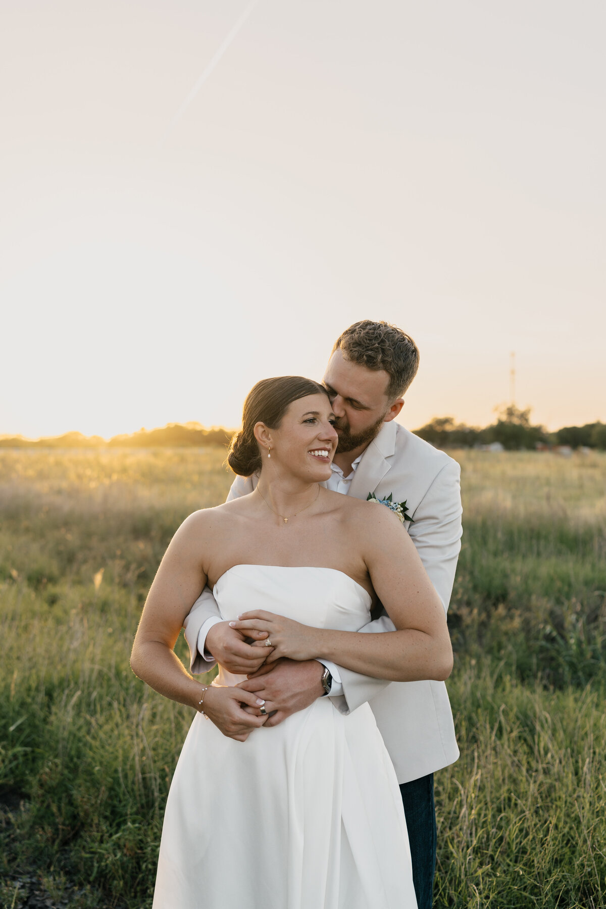 Adventurous elopement couple hiking to a mountaintop for their ceremony.