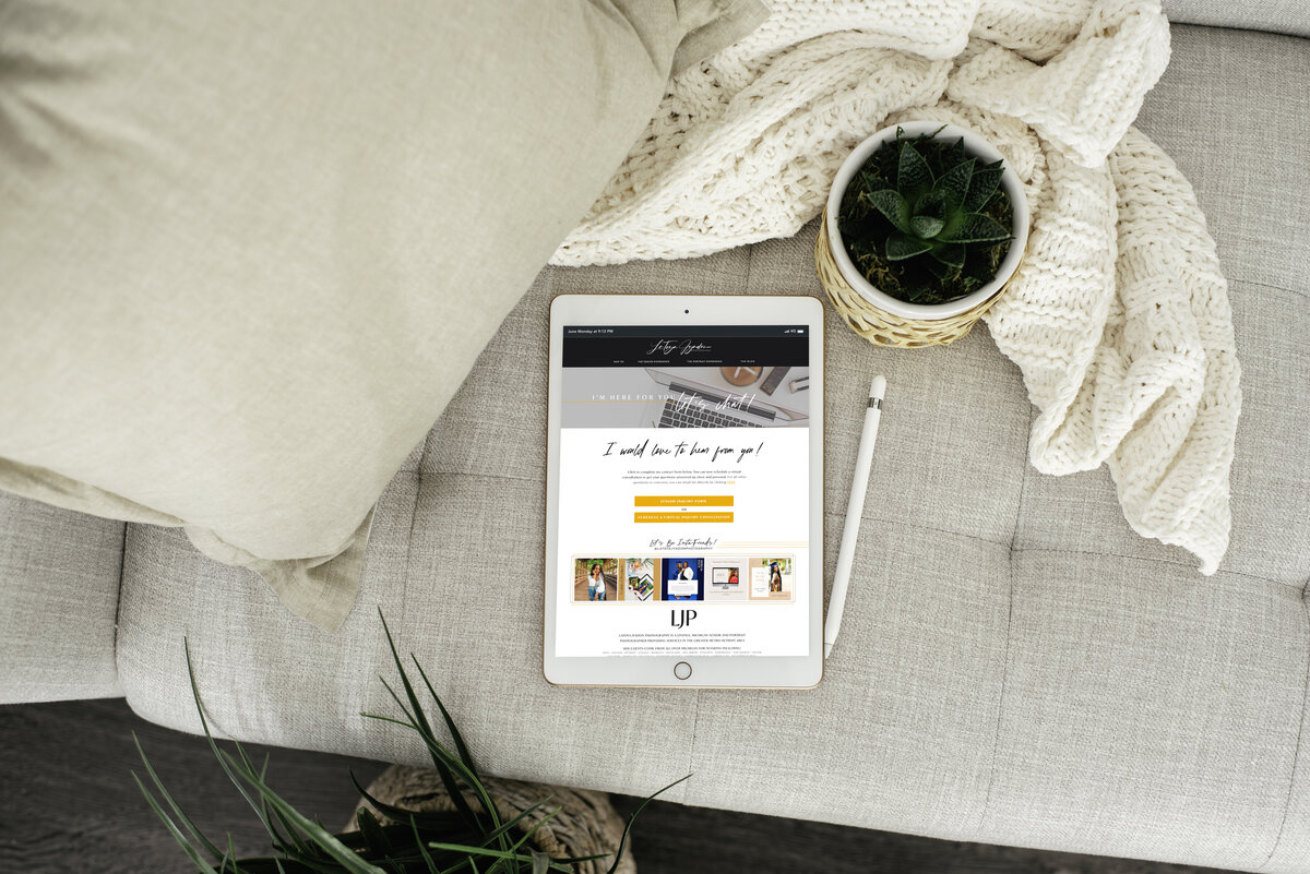 Ipad on couch with cover and a blanket