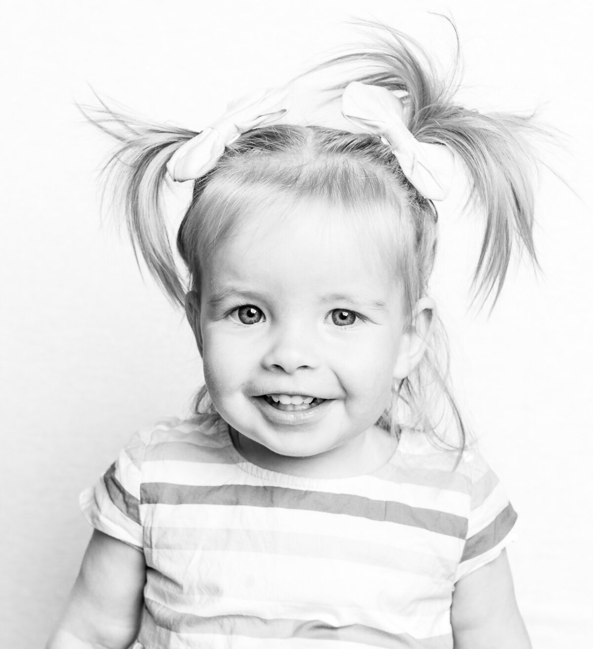 girl with pigtails smiling-4