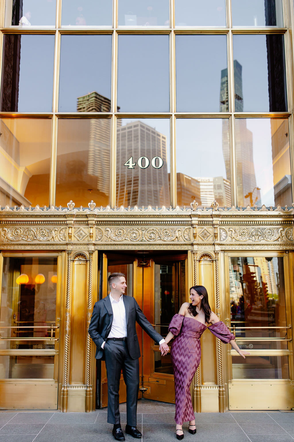 An engagement photography session at The Wrigley Building and North Ave Beach in Chicago, Illinois - 7