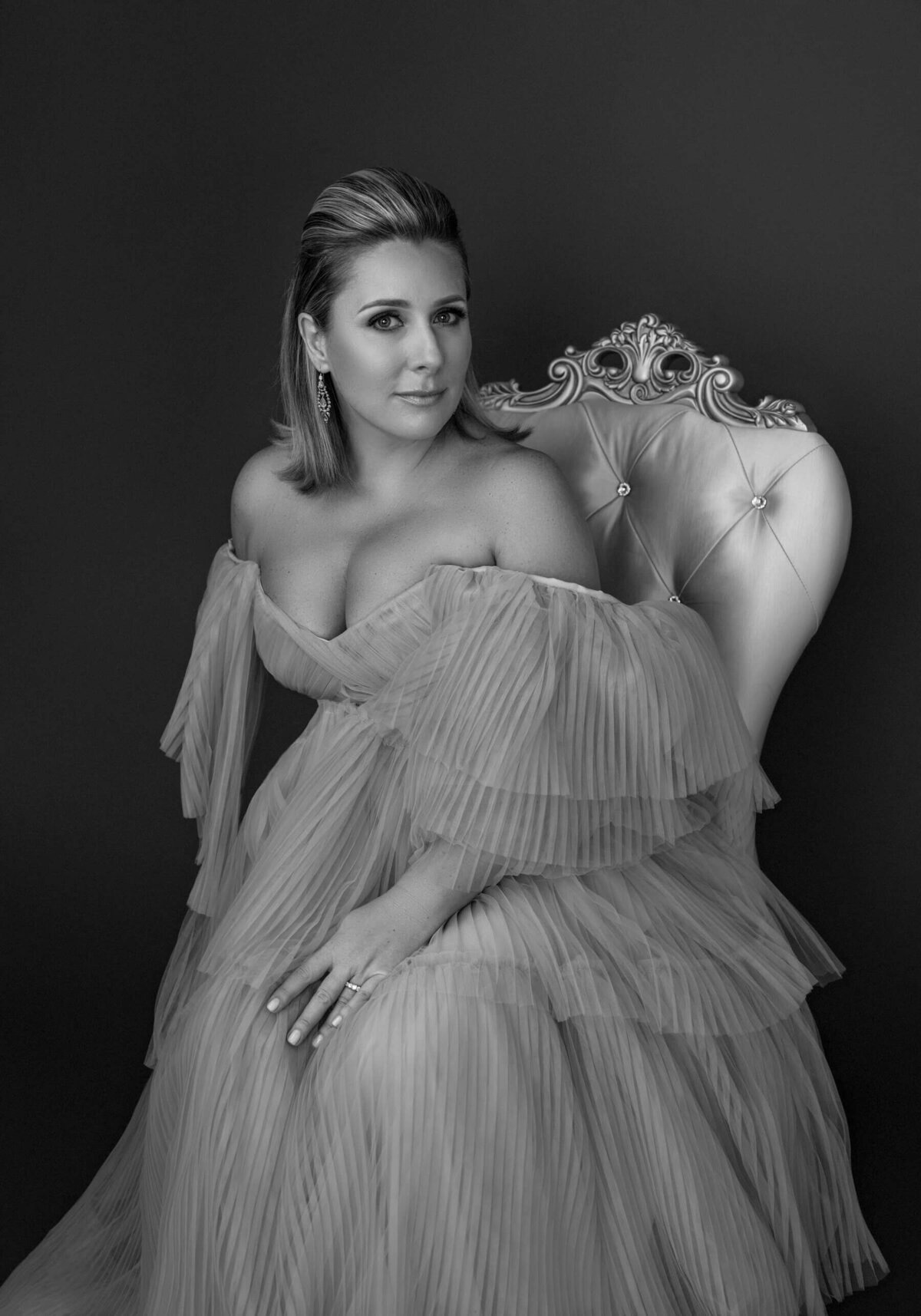 Classic Couture in Monochrome – A fashion-forward black-and-white portrait with an elegant gown.