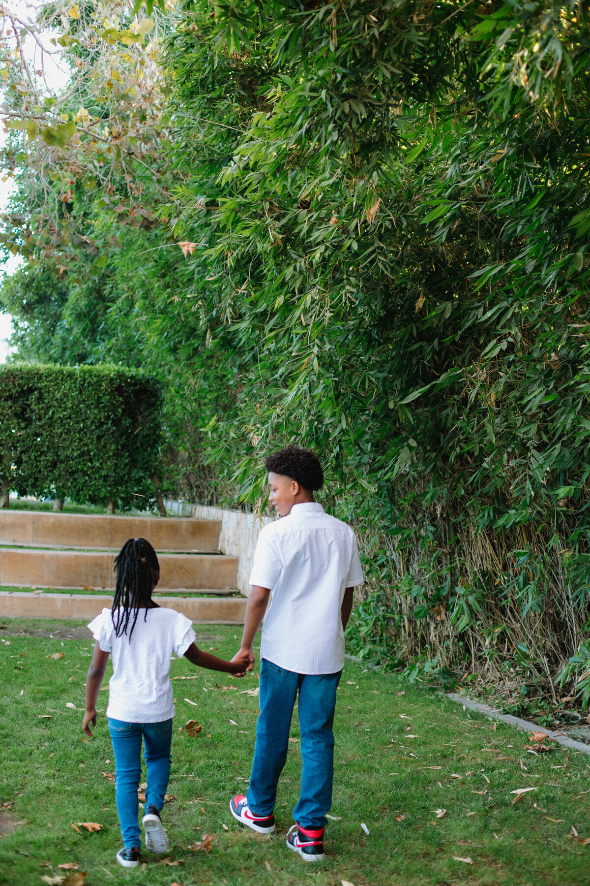 Children walking in Park at Cerritos Sculpture Garden.