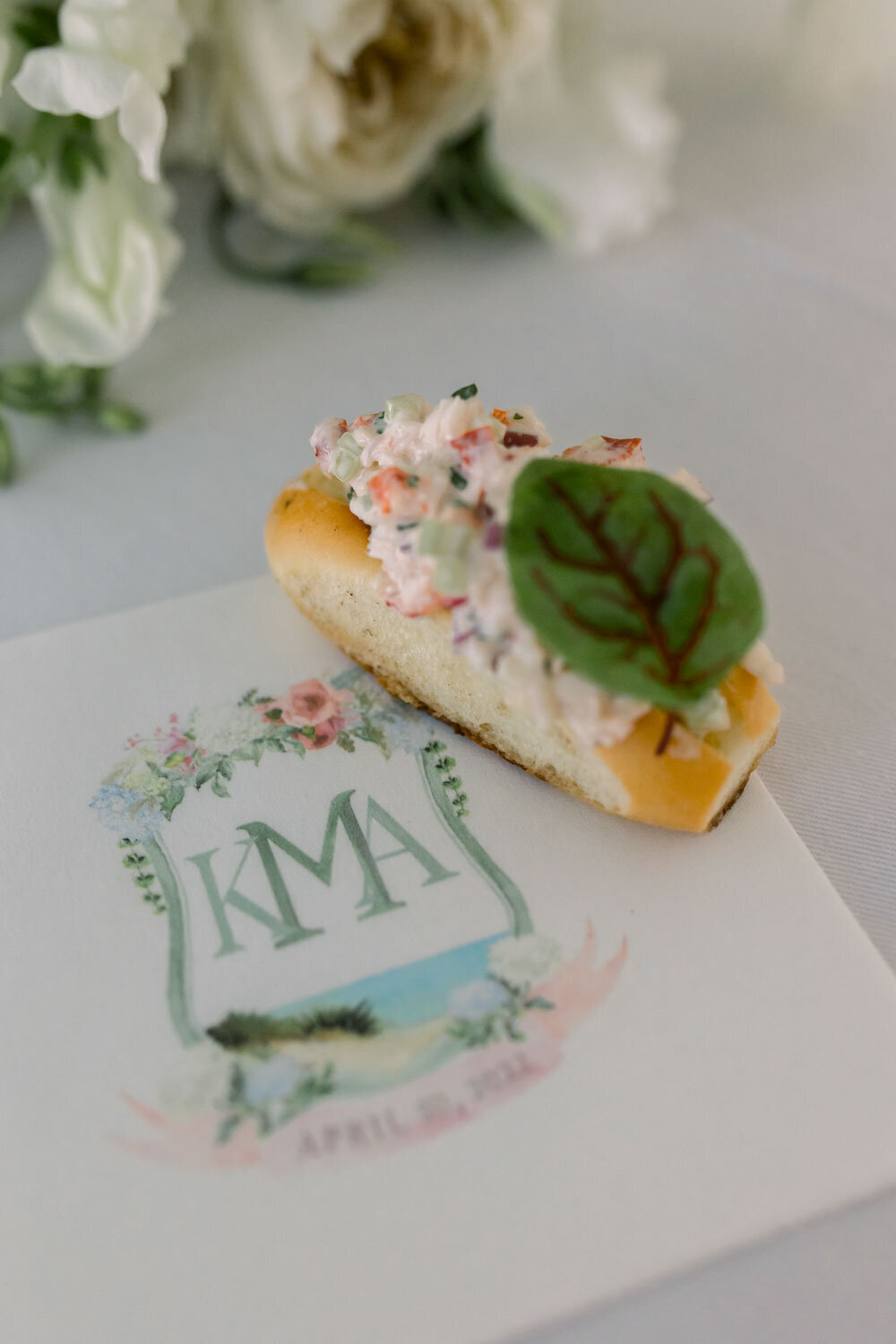 wedding monogram with food beside