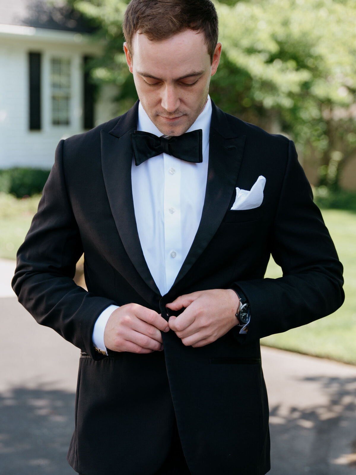 Groom getting ready for his Windows on the River wedding