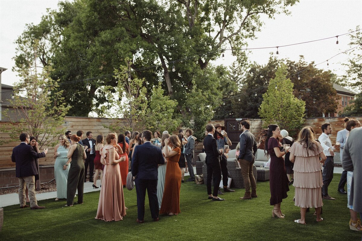 Guests enjoying outside cocktail hour at The St Vrain, Longmont wedding venue