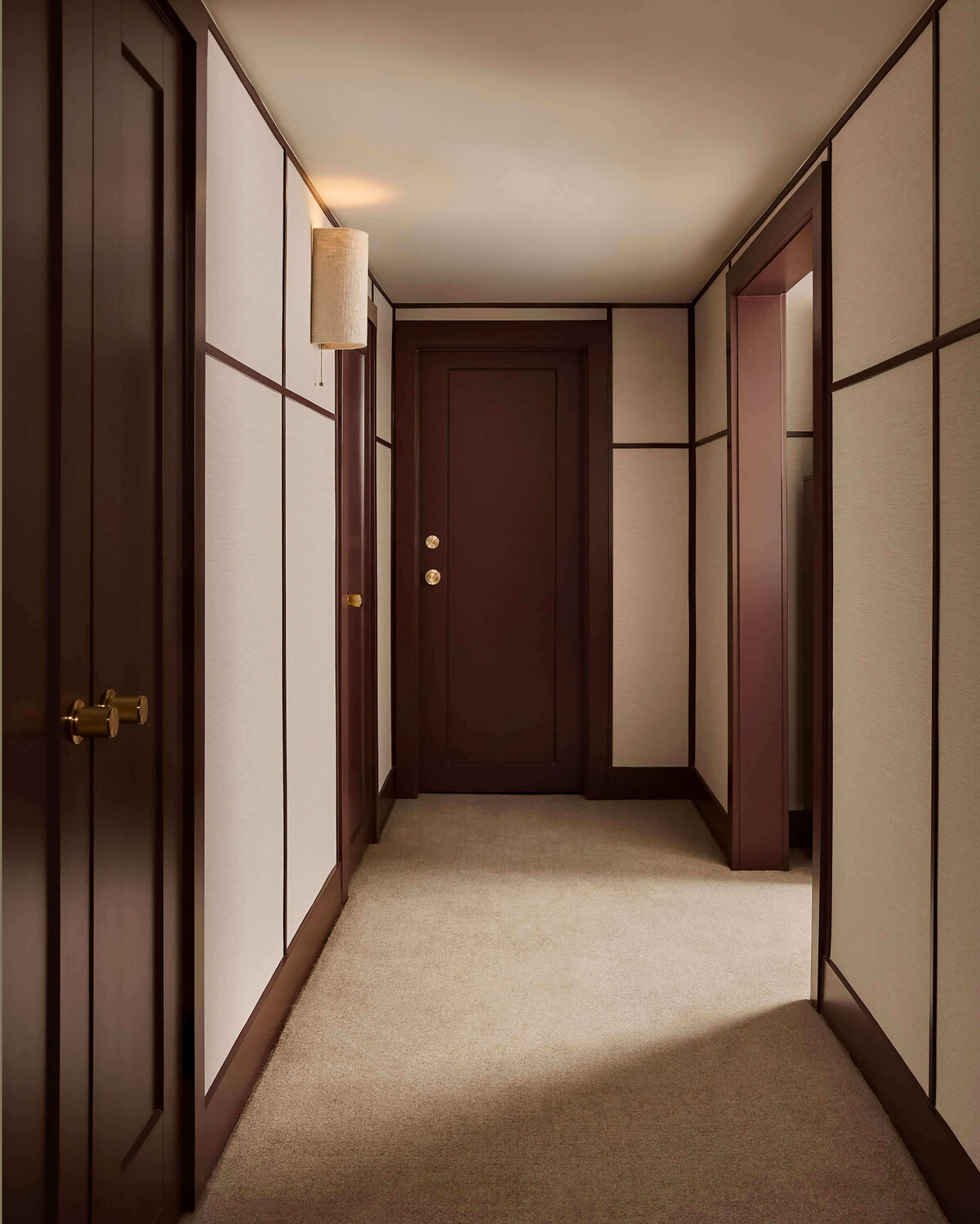 structured-hallway-burgundy-trim-neutral-walls-wilmington-interior-designer