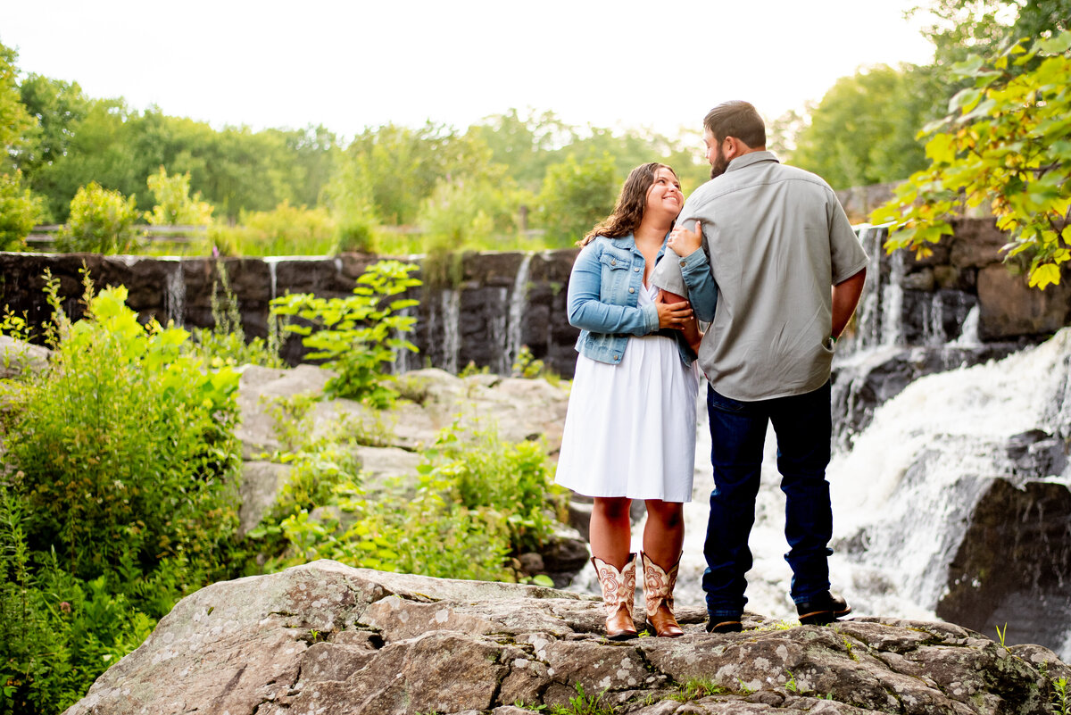 Experience the enchanting beauty of Southford Falls, Connecticut, as our engagement photo captures the love and joy in a truly breathtaking setting