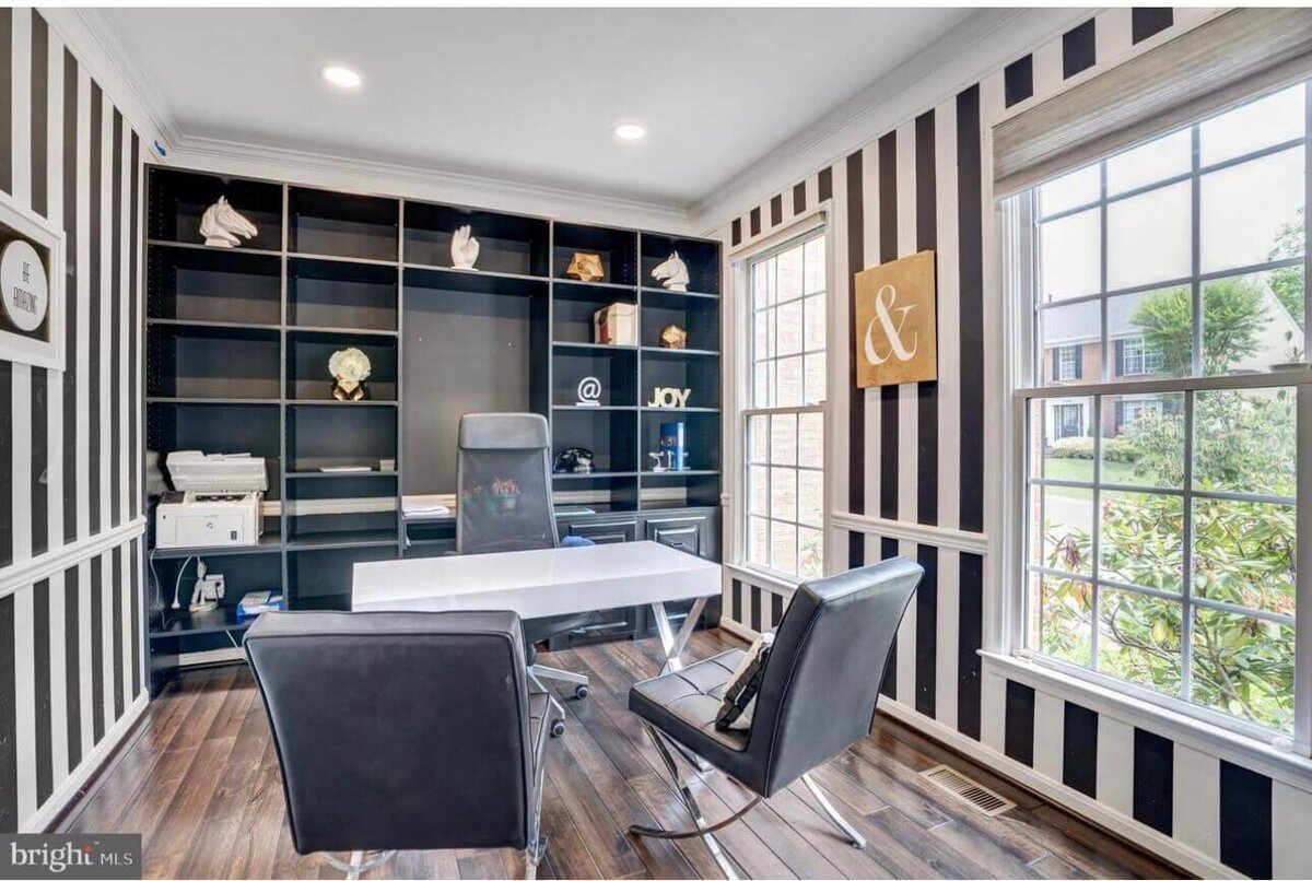 modern-home-office-black-stripe-walls-built-in-shelves.jpg