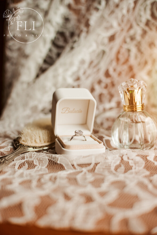 cincinnati ohio photographer videographer wedding perfume details engagement ring 