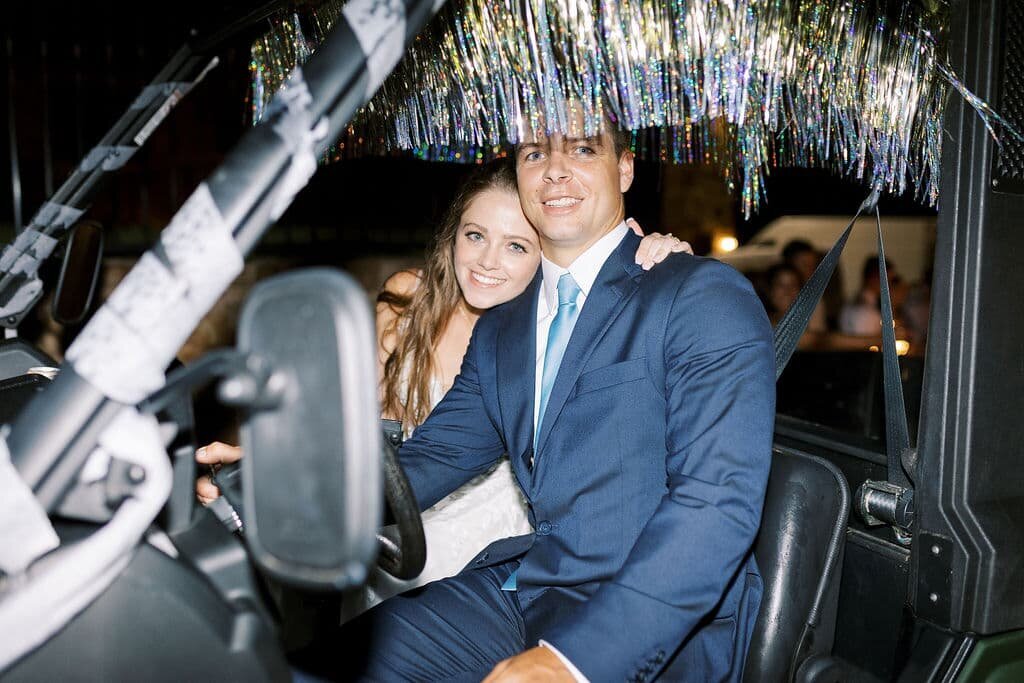 bride and groom in buggy car