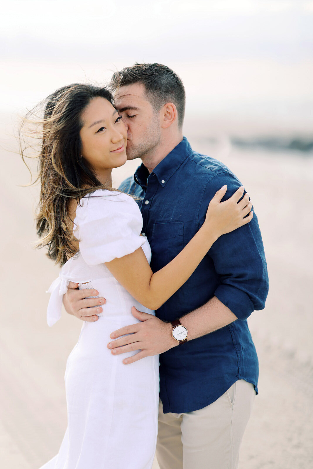 Romantic film beach engagement photography session in Cape May, New Jersey.