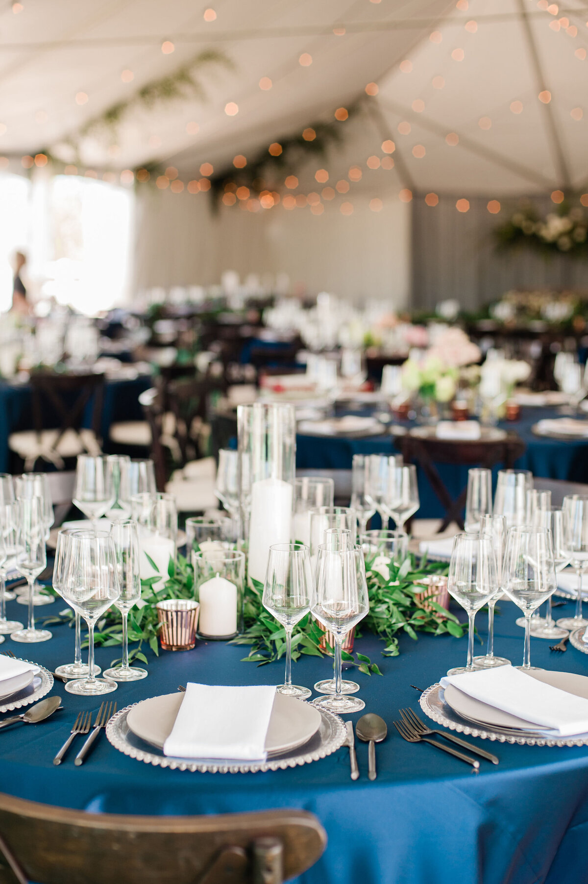 Blue cloth greenery tablescape | Bella Fleur