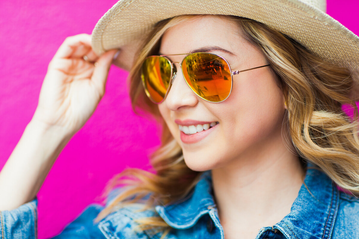 closeup portrait of a woman with sunglasses