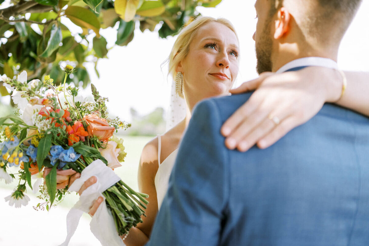 bride-looking-lovingly-into-grooms-eyes