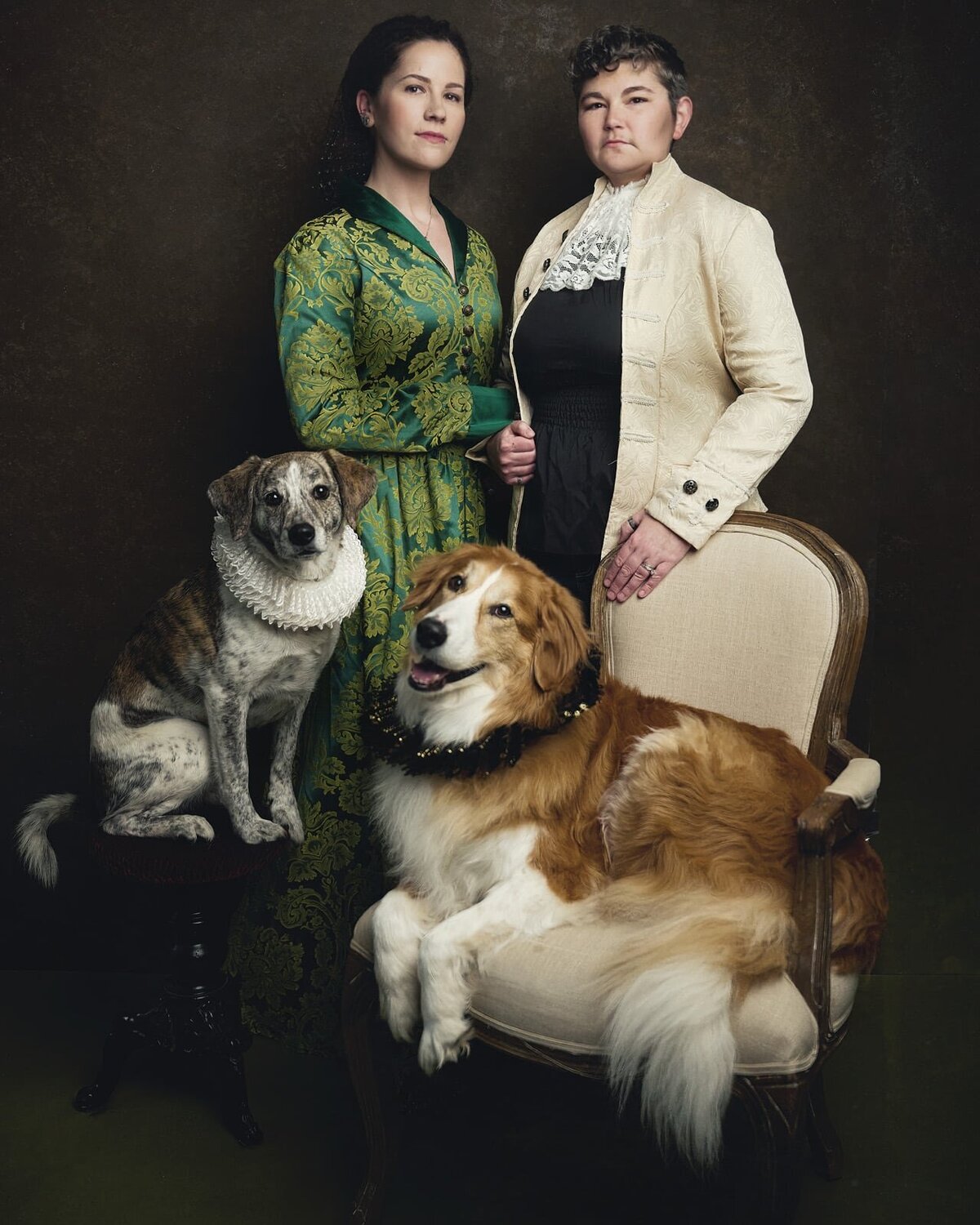 Elegant Family Portrait Featuring Two Women and Their Beloved Dogs-44