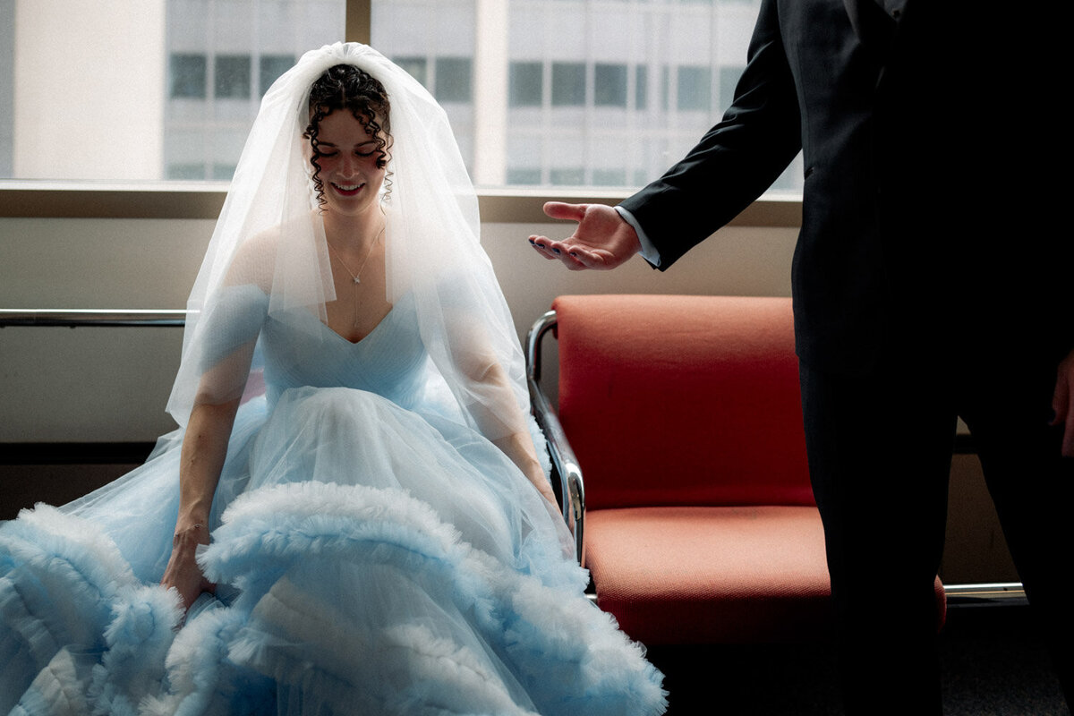 Groom offers his hand to Bride to help her get up