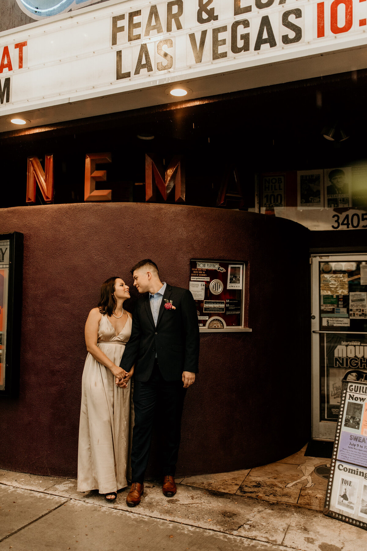bride and groom at a retro cinema in downtown Albuquerque