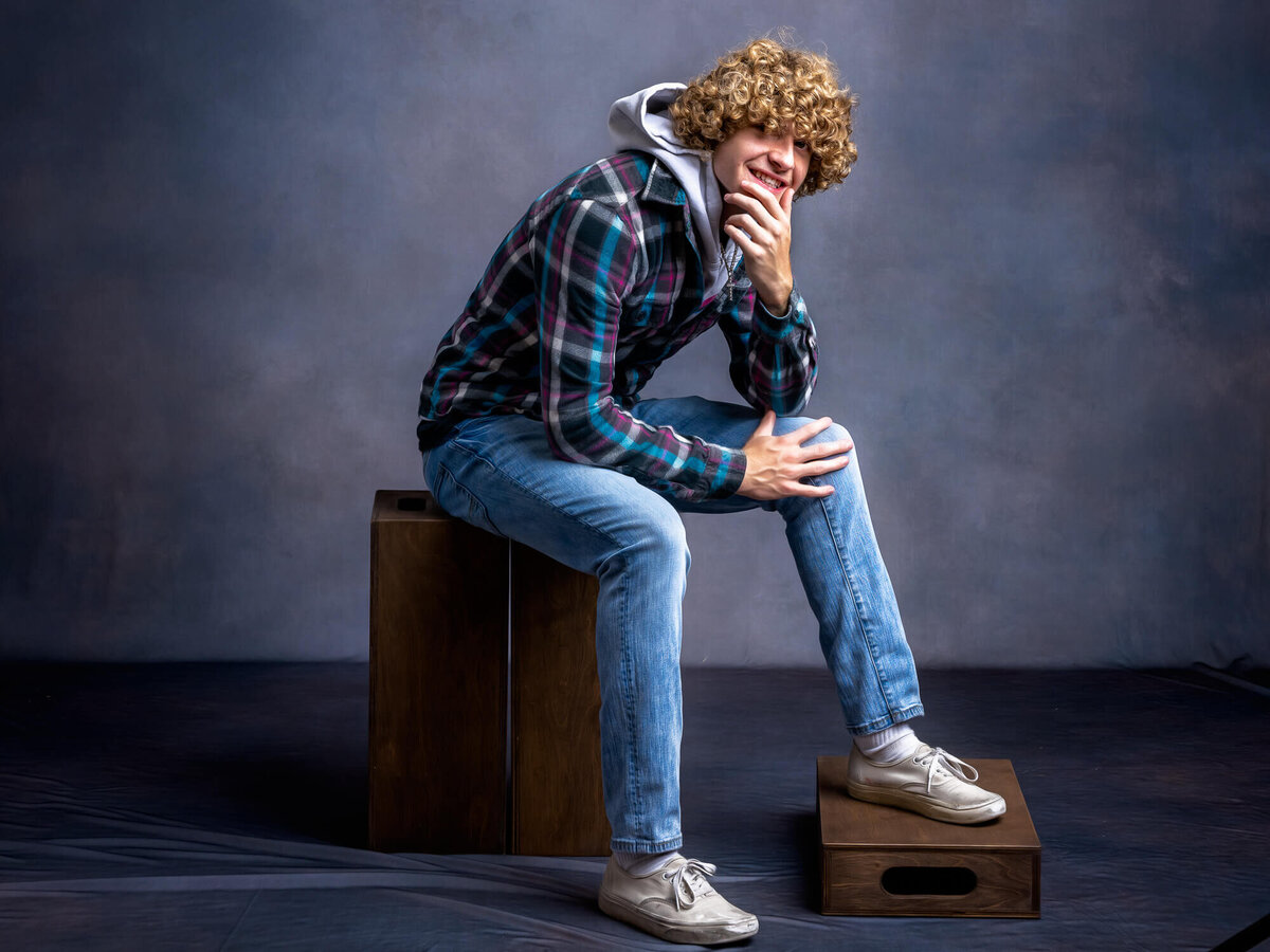 Boy poses in Prescott senior photography studio