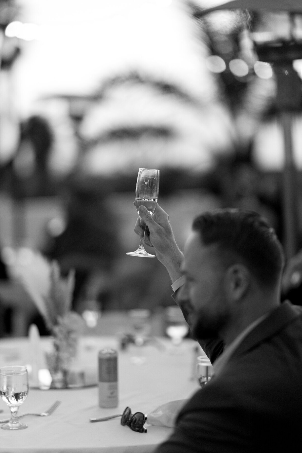 Guest raising a glasses during maid of honor speech at Hilton Beachfront Resort Santa Barbara