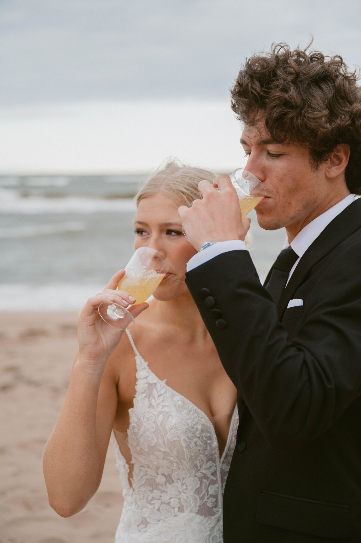 couple drinking on the beach
