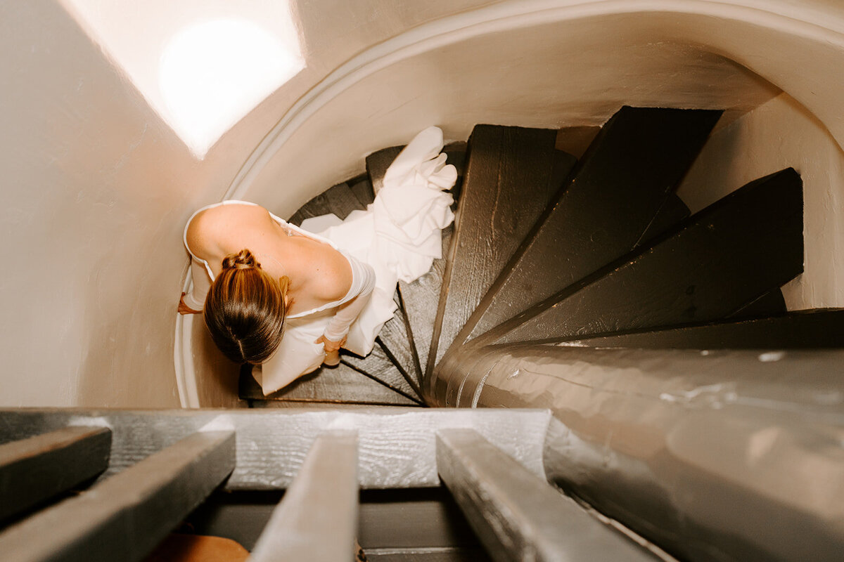 Bride walking down the staircase