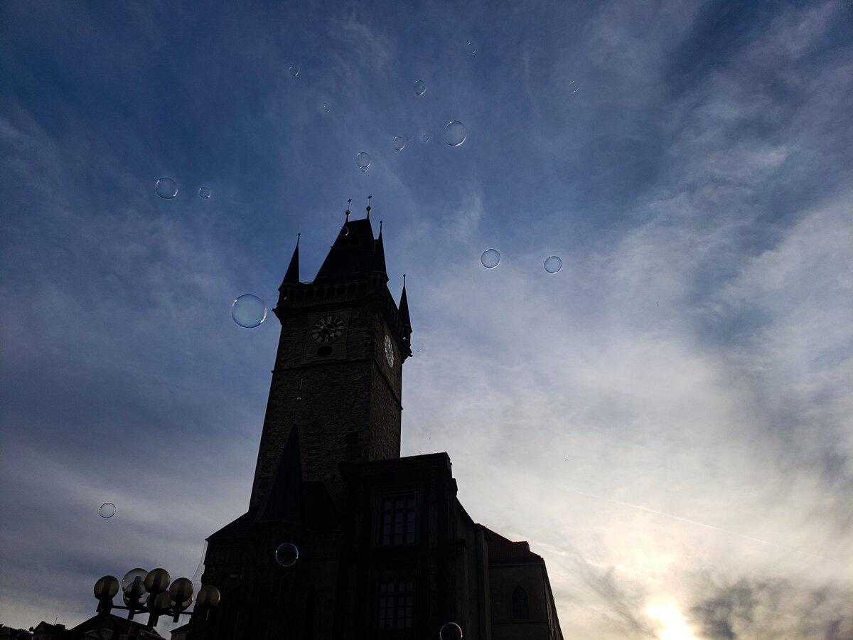 Evening Silhouette of Prague Astrological Clock Building with Bubbles