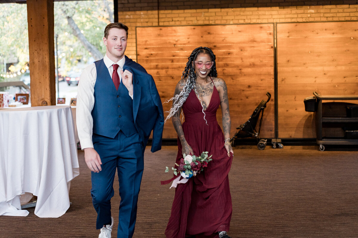 Candid kiss between wedding couple