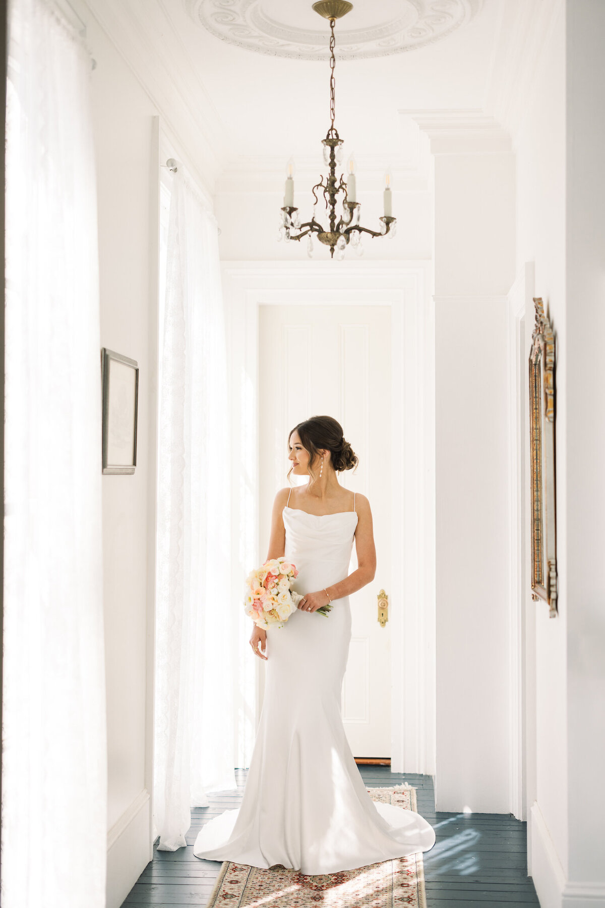 A stunning bridal portrait captured at the historic Arlington Mansion in Franklin, LA, showcasing elegance and southern charm, beautifully documented on film by Morgan Alysse, Louisiana film photographer.