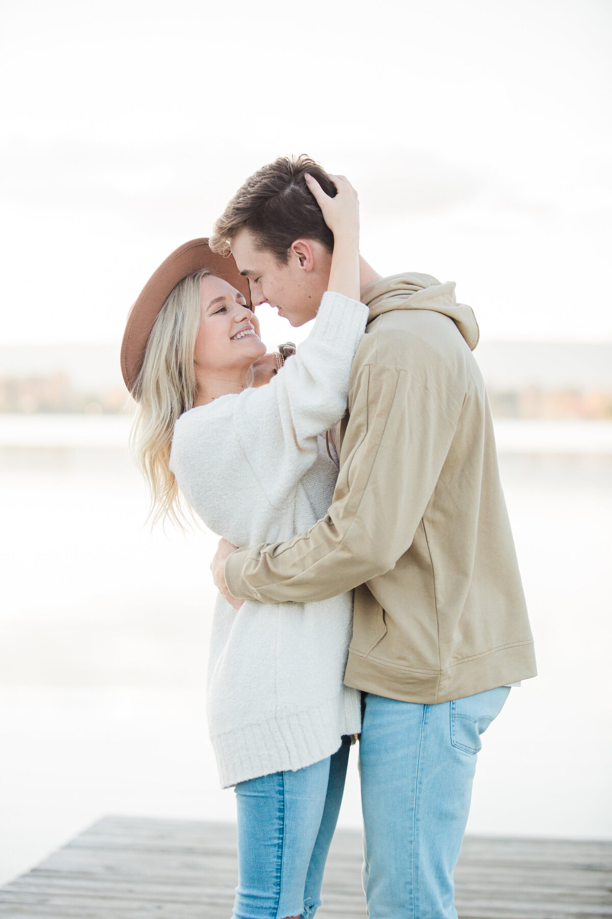 couple smiling and posing for engagement photos in Chattanooga