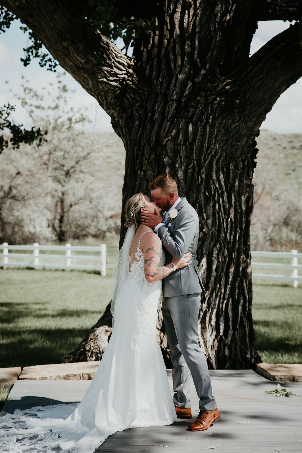 Bride and groom first kiss