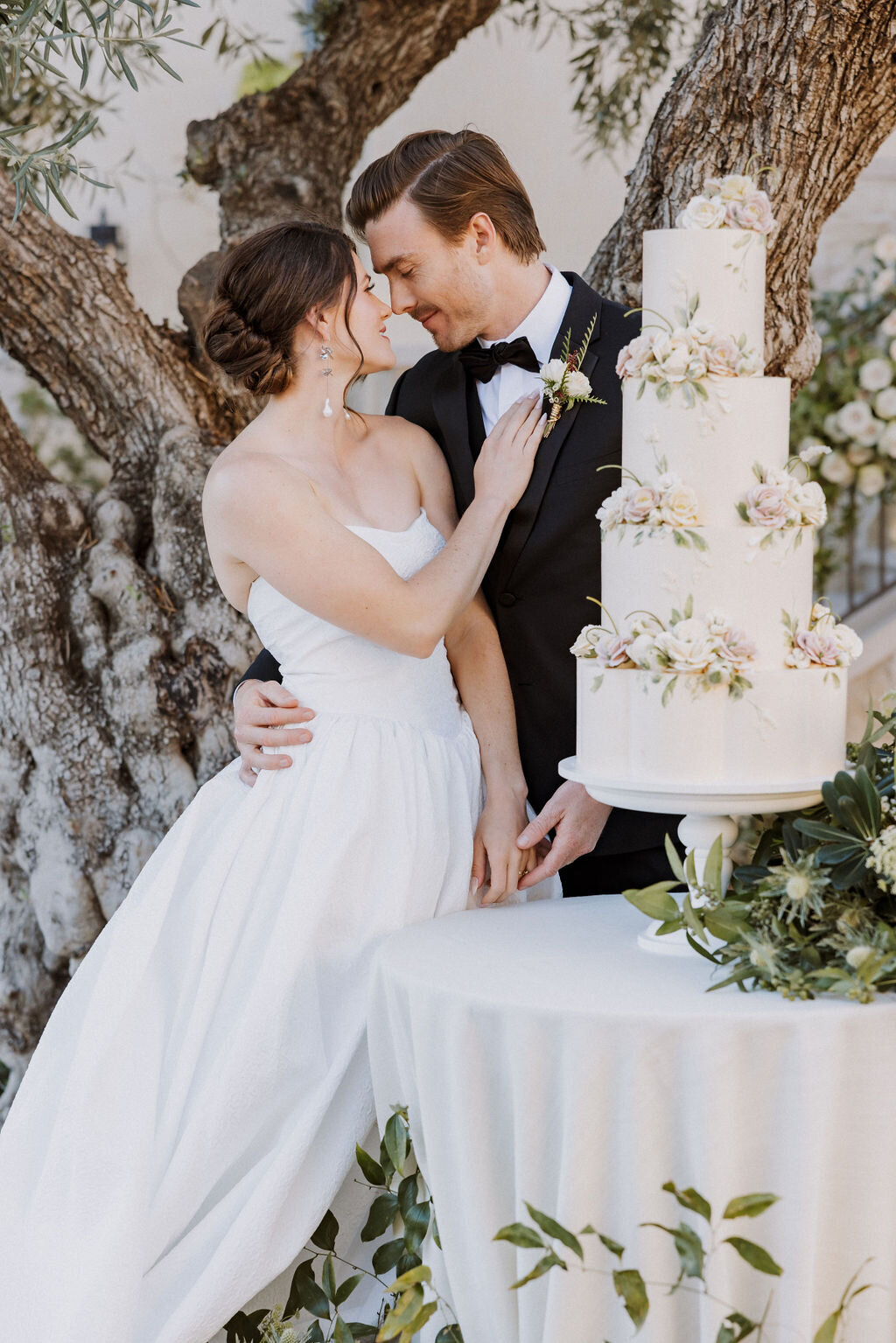 bride and groom with cake monserate winery wedding editorial, timeless, candid