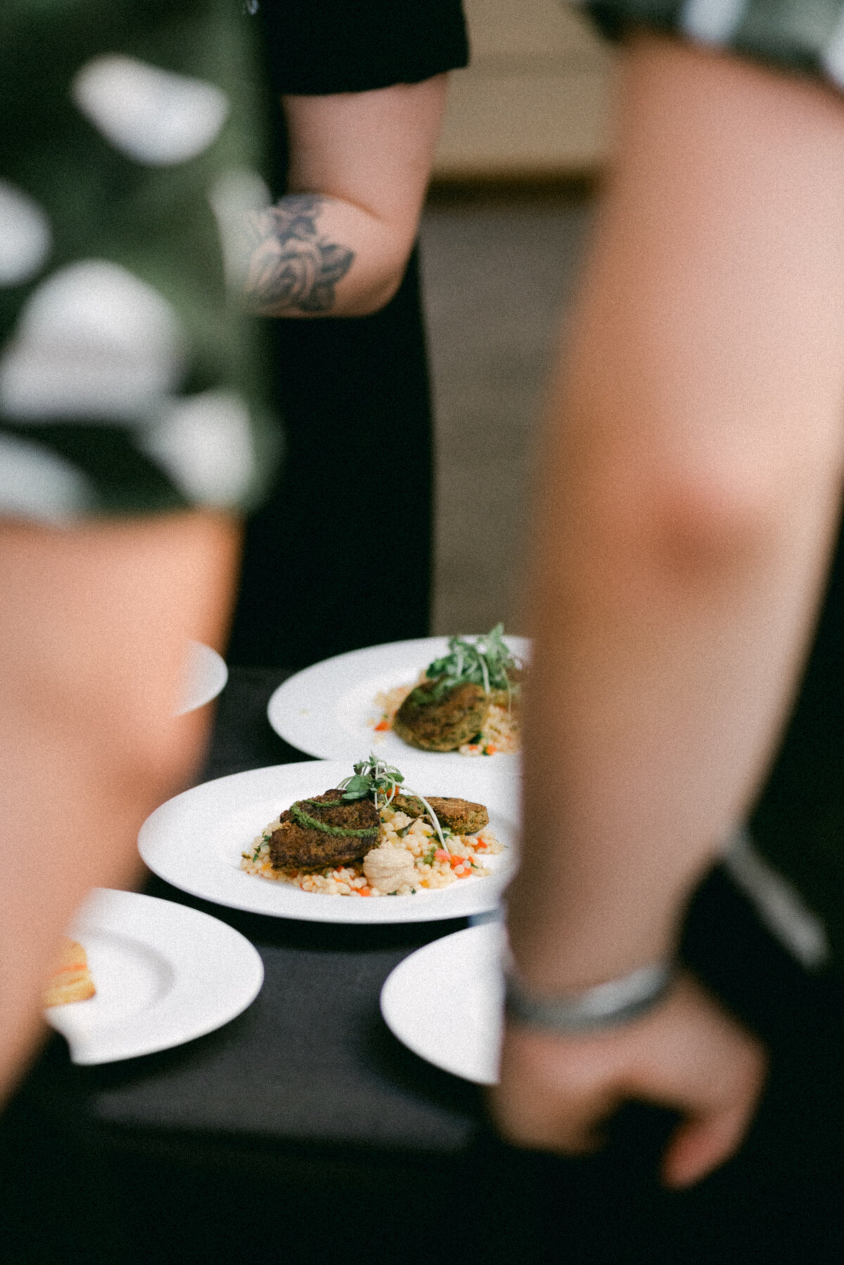 Catering preparing wedding dinner in an image photographed by wedding photographer Hannika Gabrielsson.