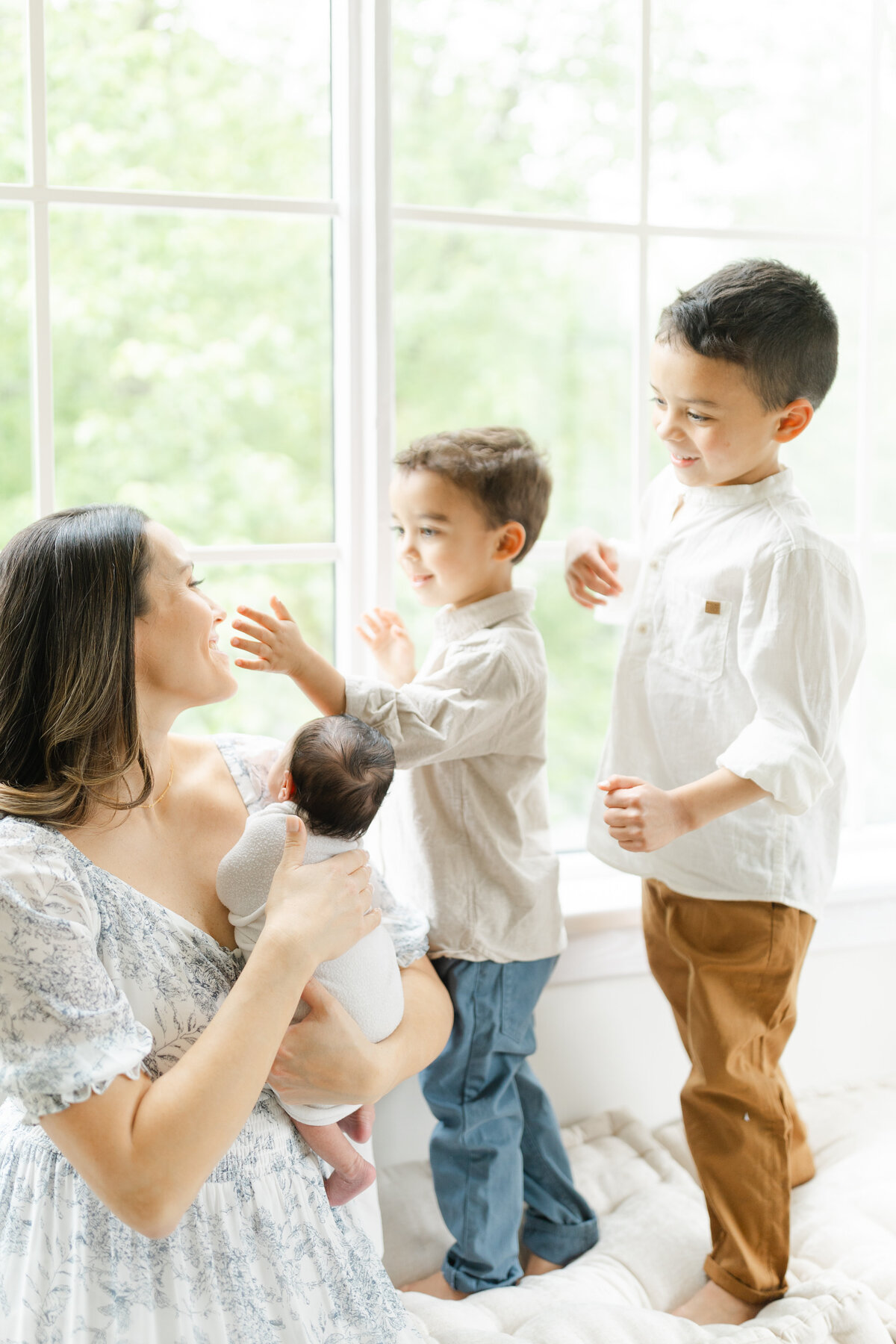 Newborn photography session with siblings at a Philadelphia photography studio - 9