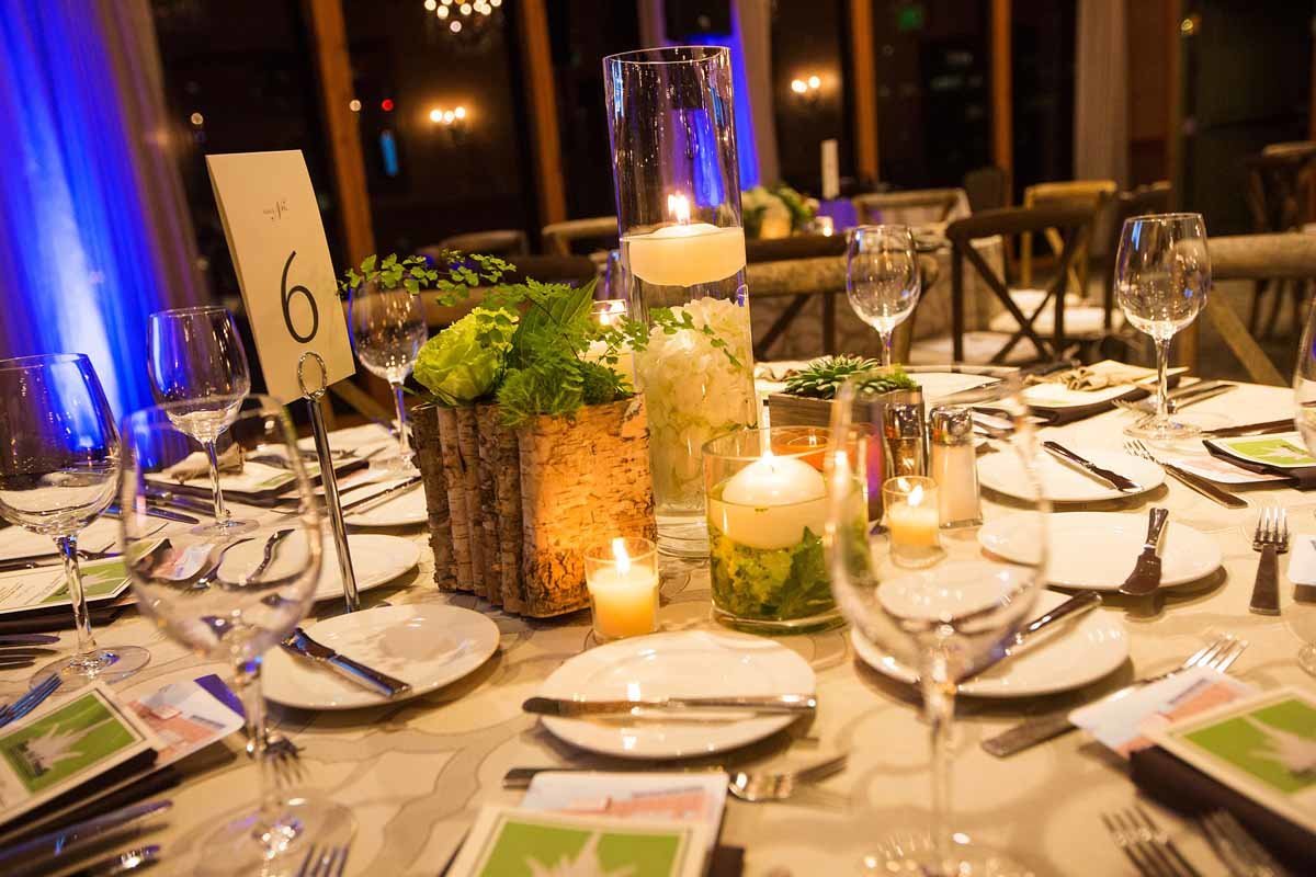 Seahawks fundraiser with centerpieces of candles and succulents