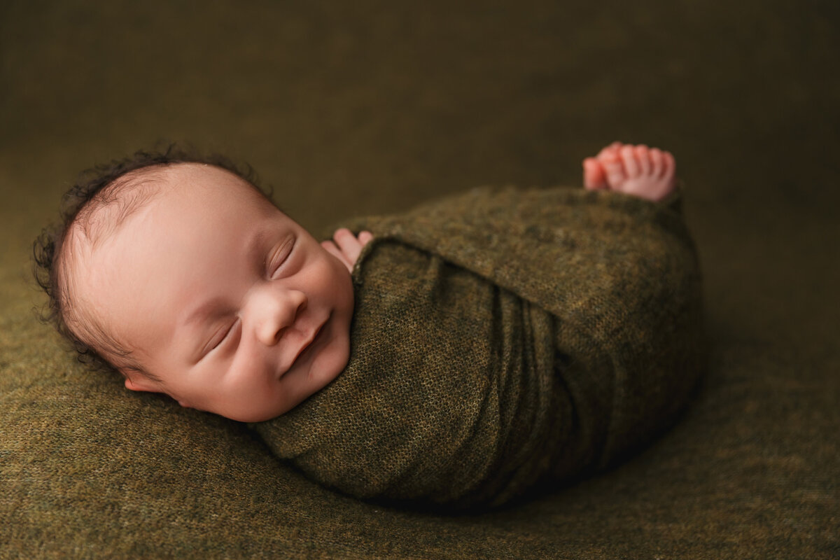 baby portraits on green backdrop phoenix