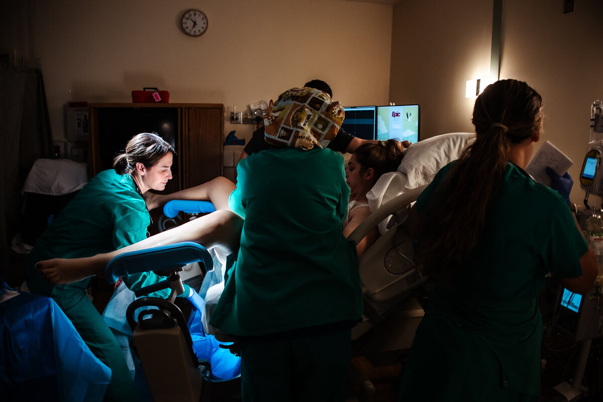 A woman in labor, pushing out the baby at Memorial Hospital in Modesto,  is having a much smoother birth because she hired a Modesto Doula for support. 