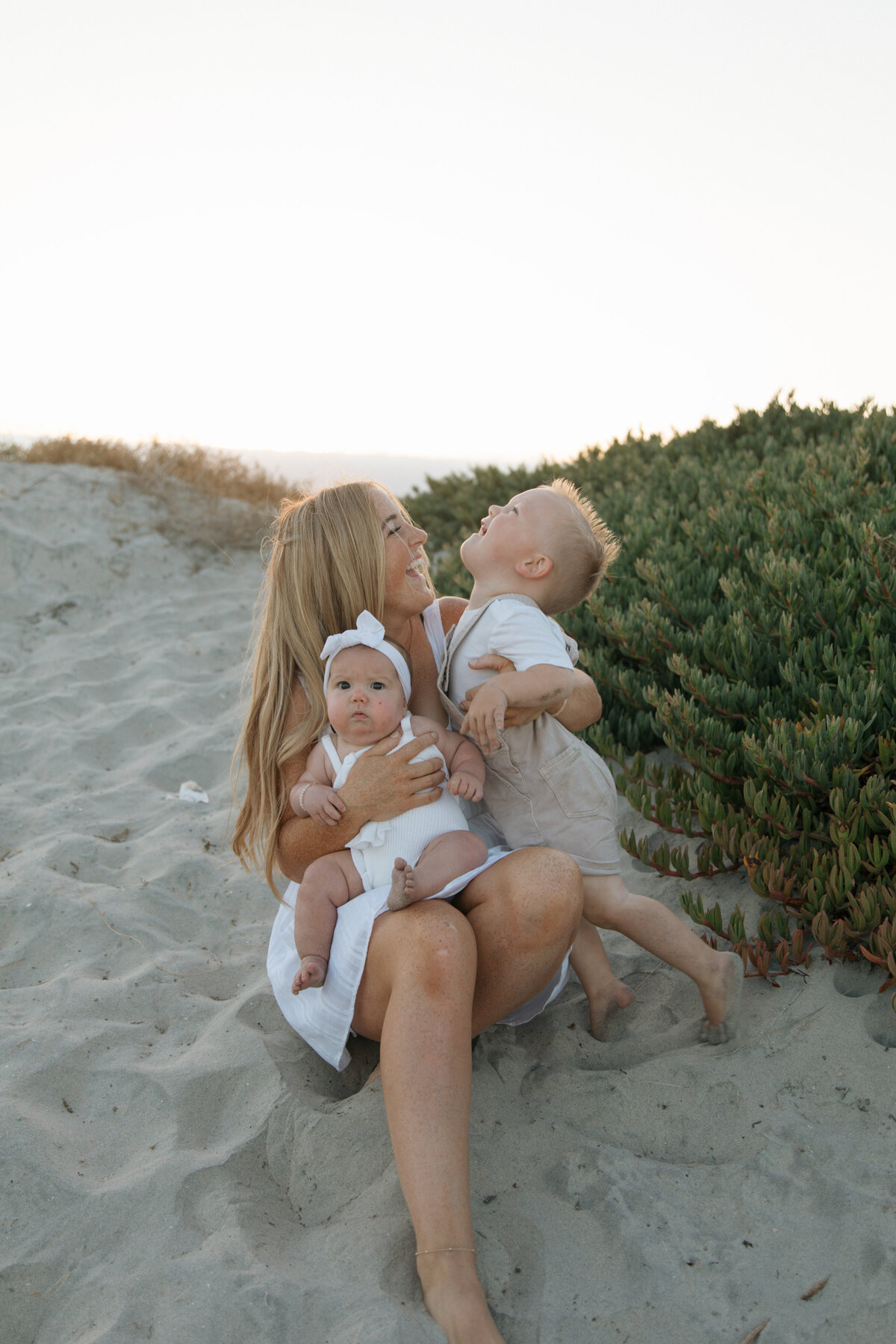 mom with kids laughing
