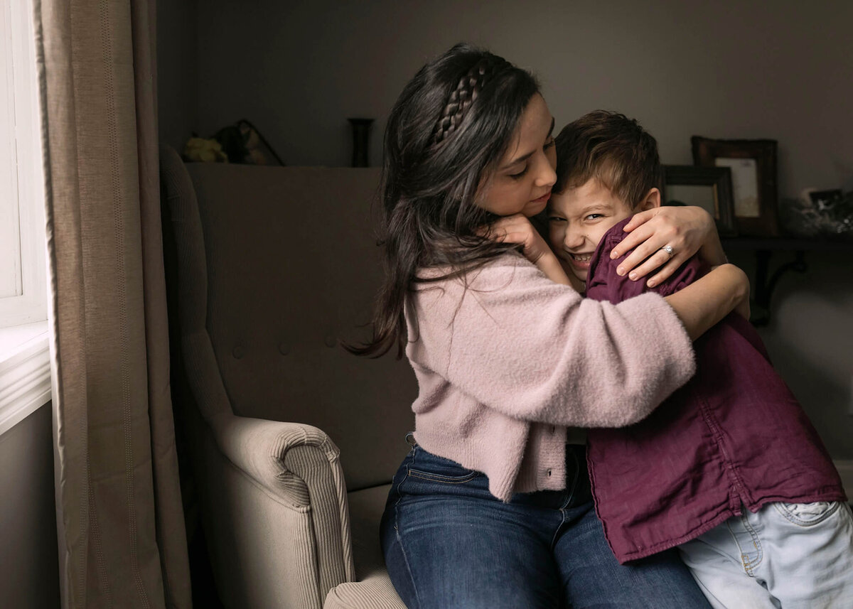 NJ motherhood photography session with mom hugging her son