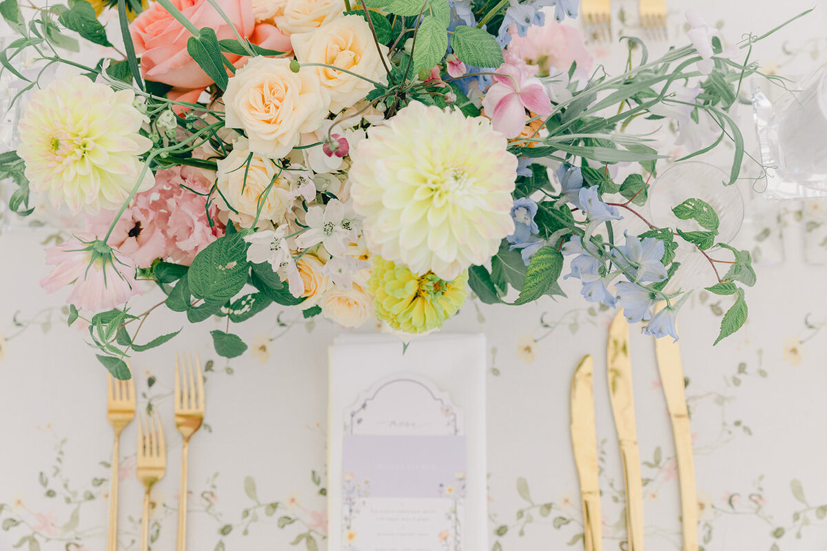 Bright centrepieces of pastel flowers for a wedding at the Forest and Stream Club. 