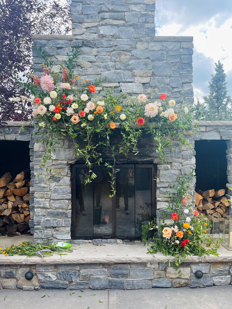 Romantic and feminine wedding ceremony floral decor by Le Bouquet, Calgary wedding florist, featured on the Brontë Bride Vendor Guide.