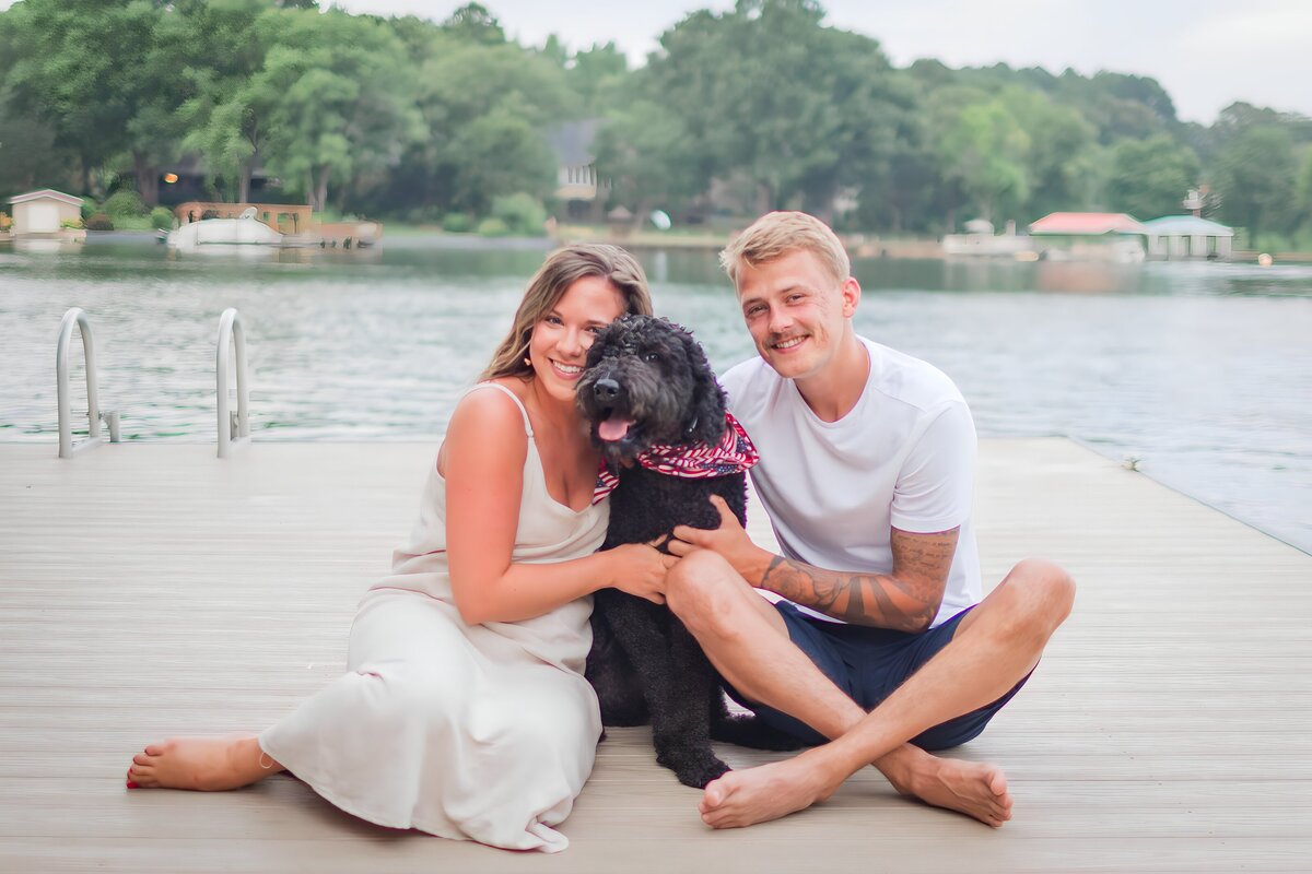Lake Norman family photography with couple and their dog on a dock