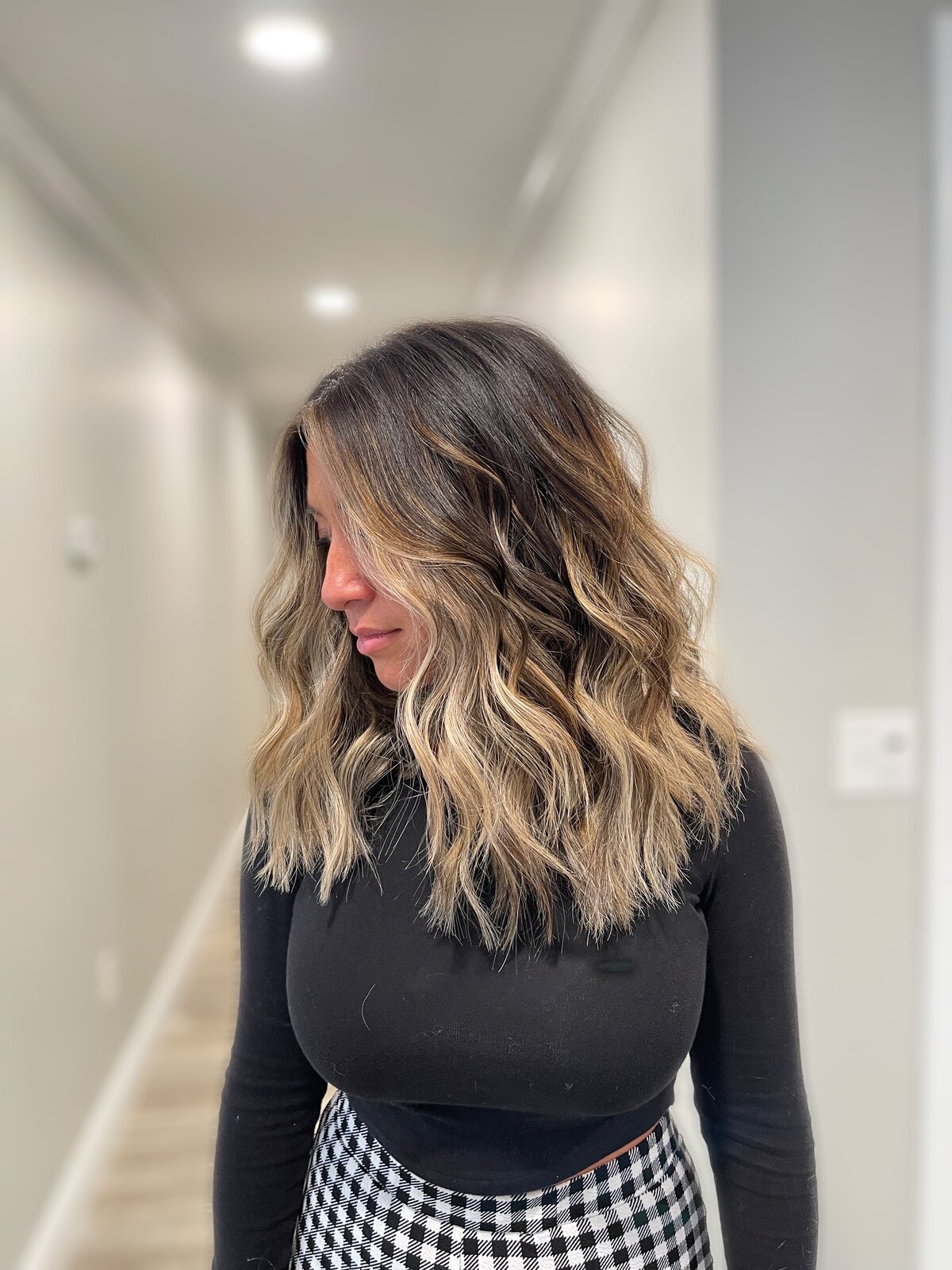 dark brunette hair with blonde balayage highlights