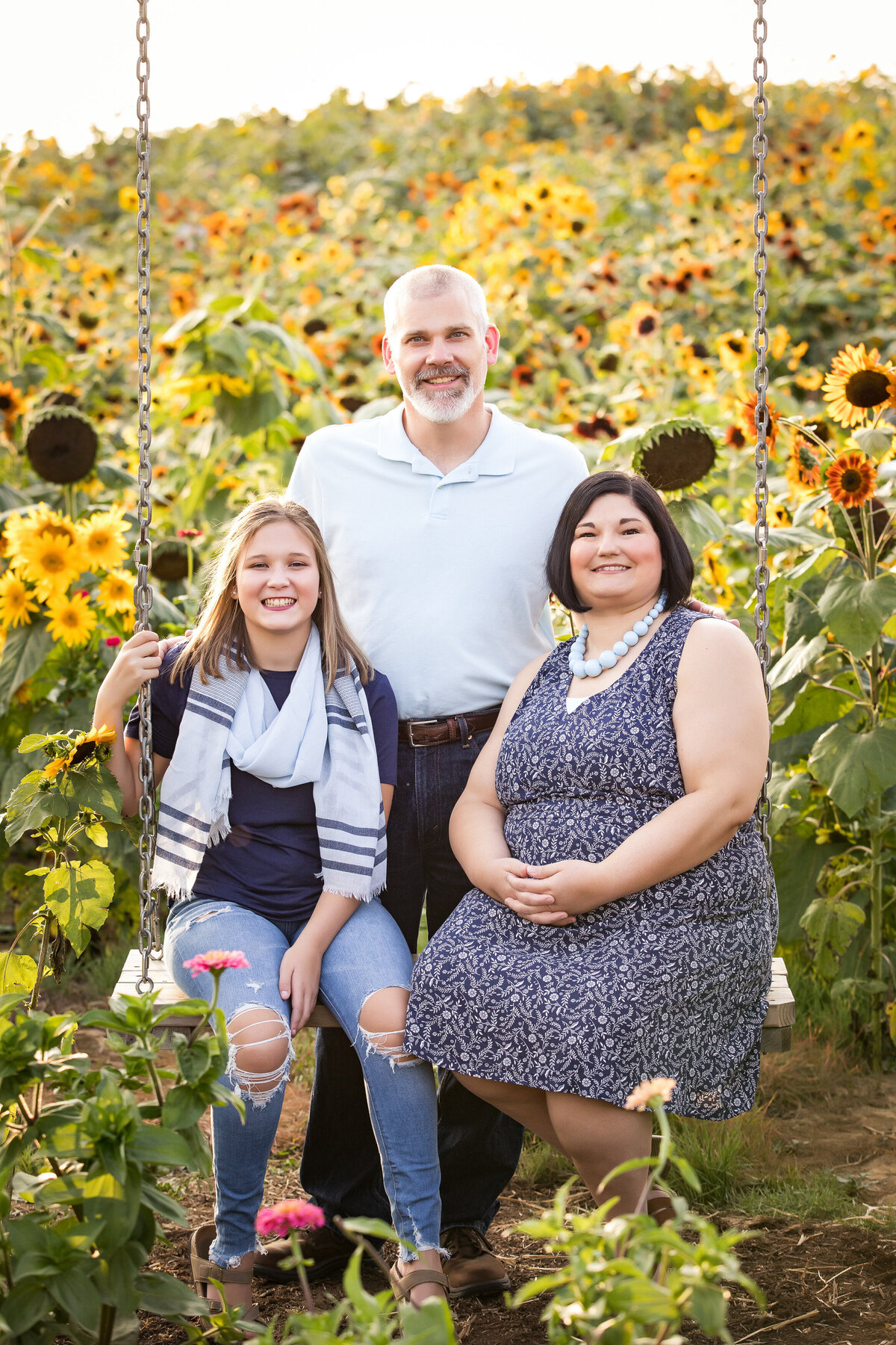 family in sunflowers