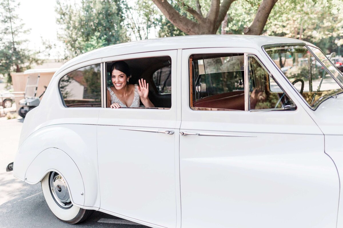 bride in a vintage car