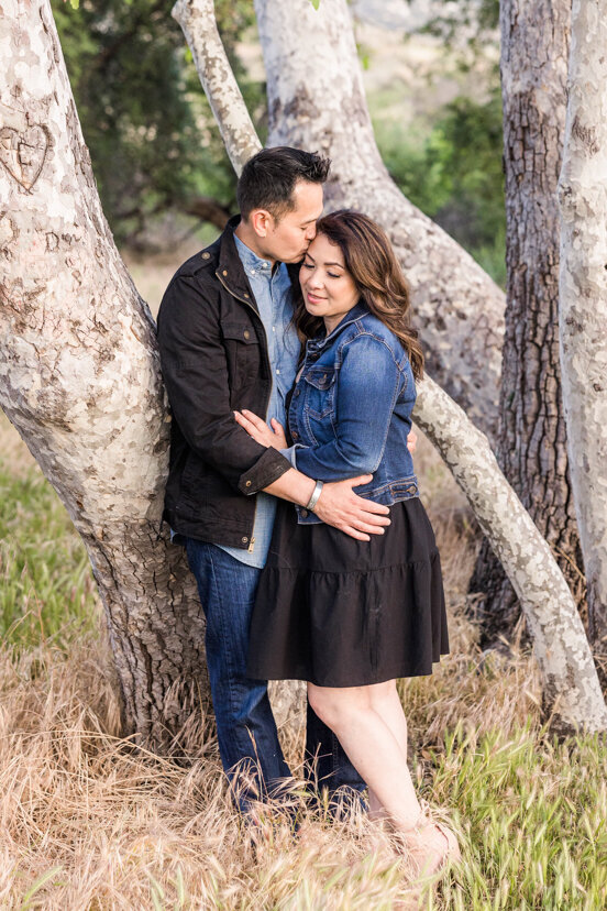 couple-kissing-under-tree--sweetwater-river-bridge-san-diego