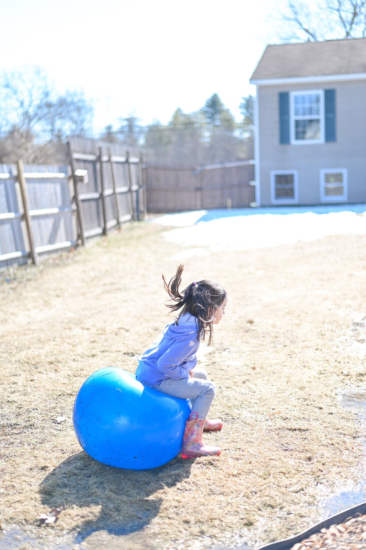 Student playing outside at House of Parker Preschool in Gorham, ME
